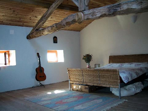 Main bedroom: larger of the two upstairs rooms, open plan and mind your head